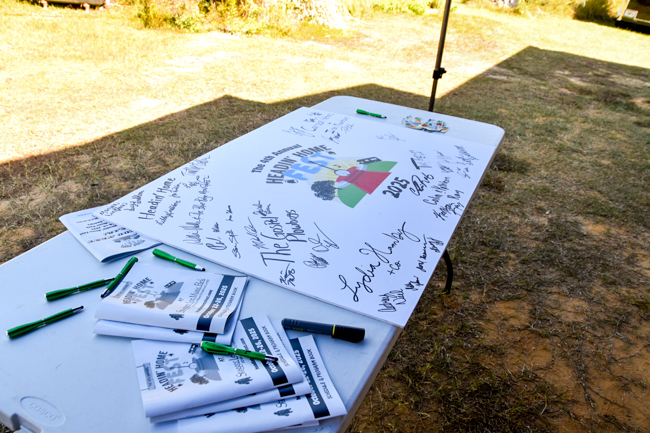 Backstage signing board at Headin’ Home Fest 2025 - photo courtesy of the festival